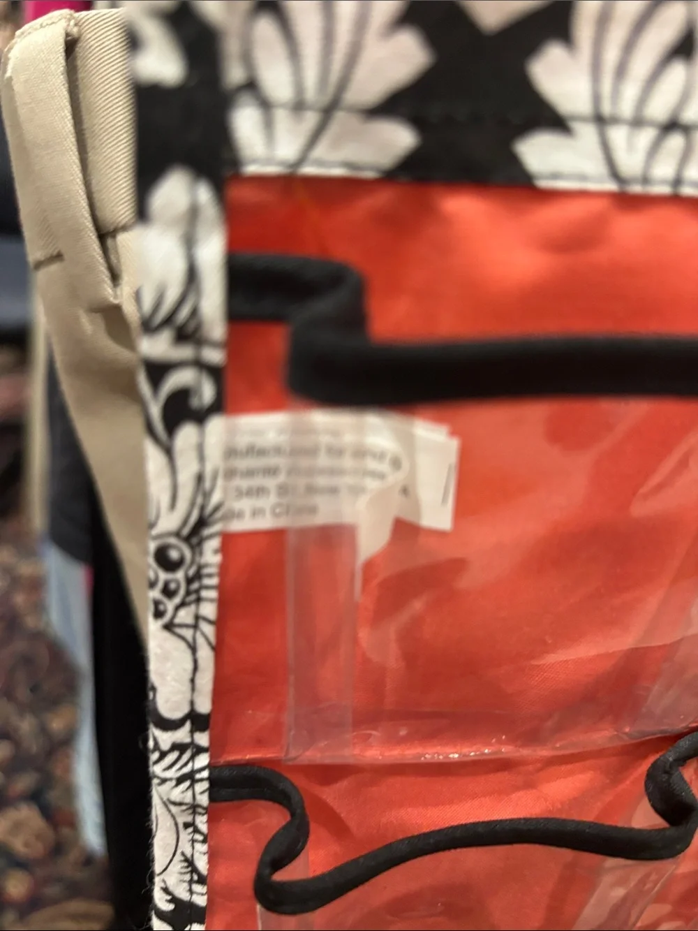 Charming Charlie 66-Pocket Hanging Organizer in Red and Black